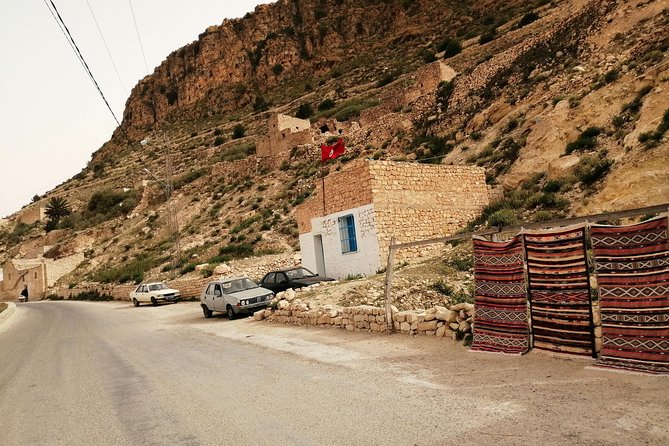 One night under the tent: Tataouine - Chenini - Ksar Ghilane - Matmata - Ksar Ghilane, hot water, palms, and open sand